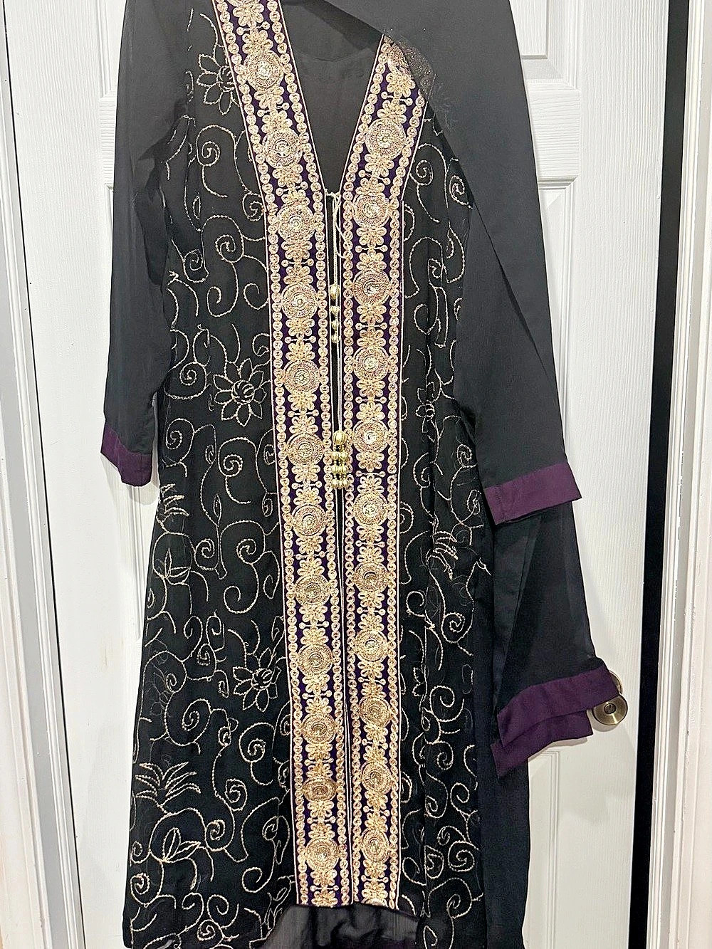 Pakistani outfit with gold and purple sequence and tilla work, shirt and dupatta